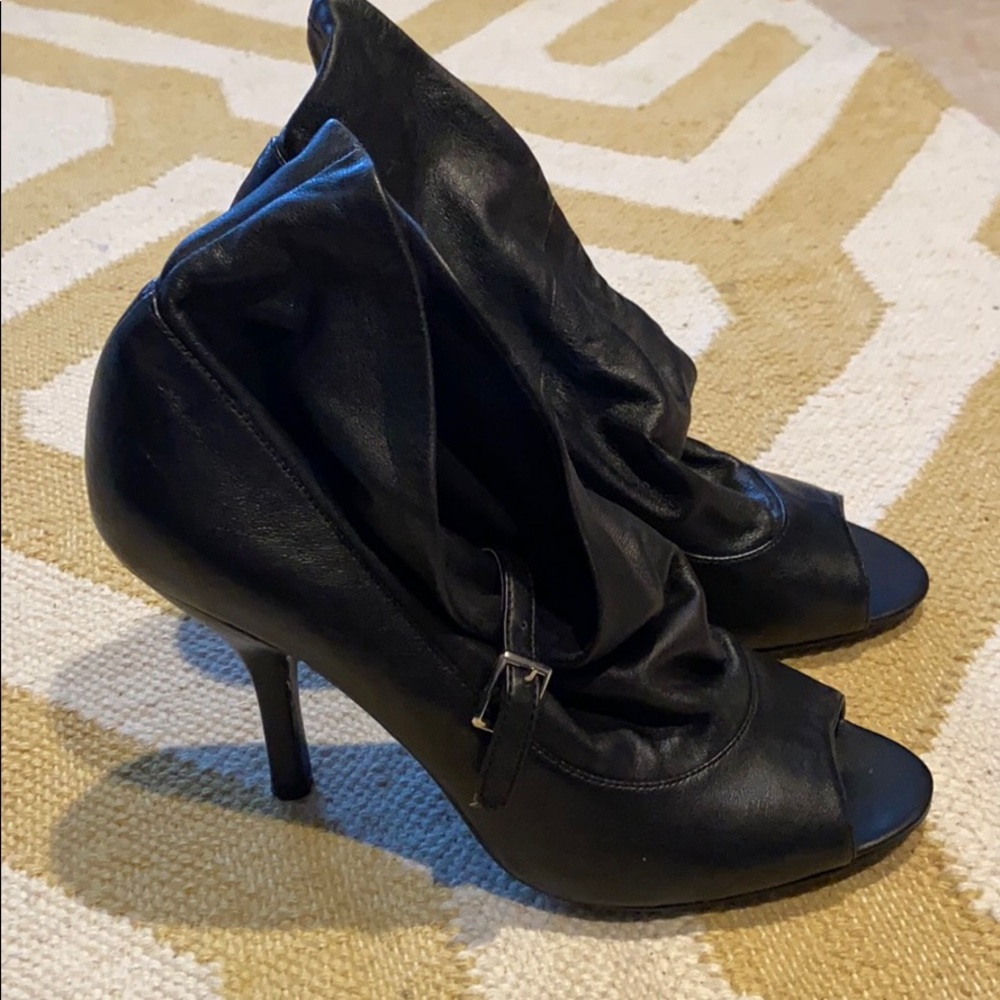 Black slouch buckle peep toe booties